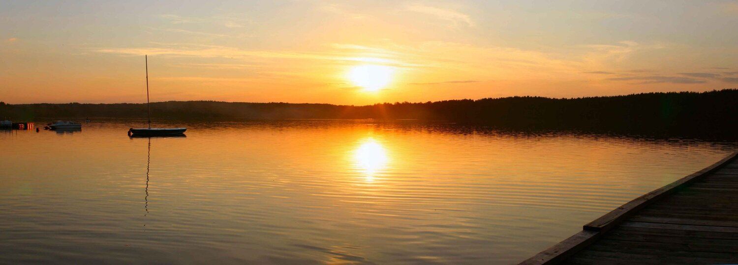 sunset over a tranquil lake mural, perfect for indoor and outdoor spaces.