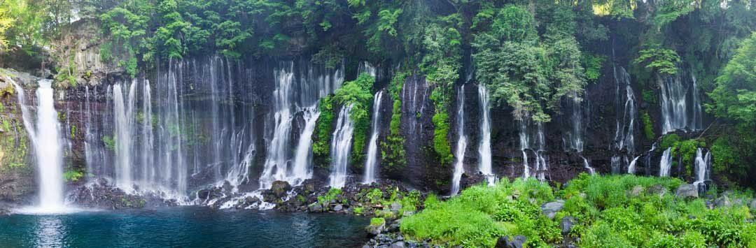 Shiraito Falls in Fujinomiya, Japan, cascading with clear spring water from Mt. Fuji's foothills.