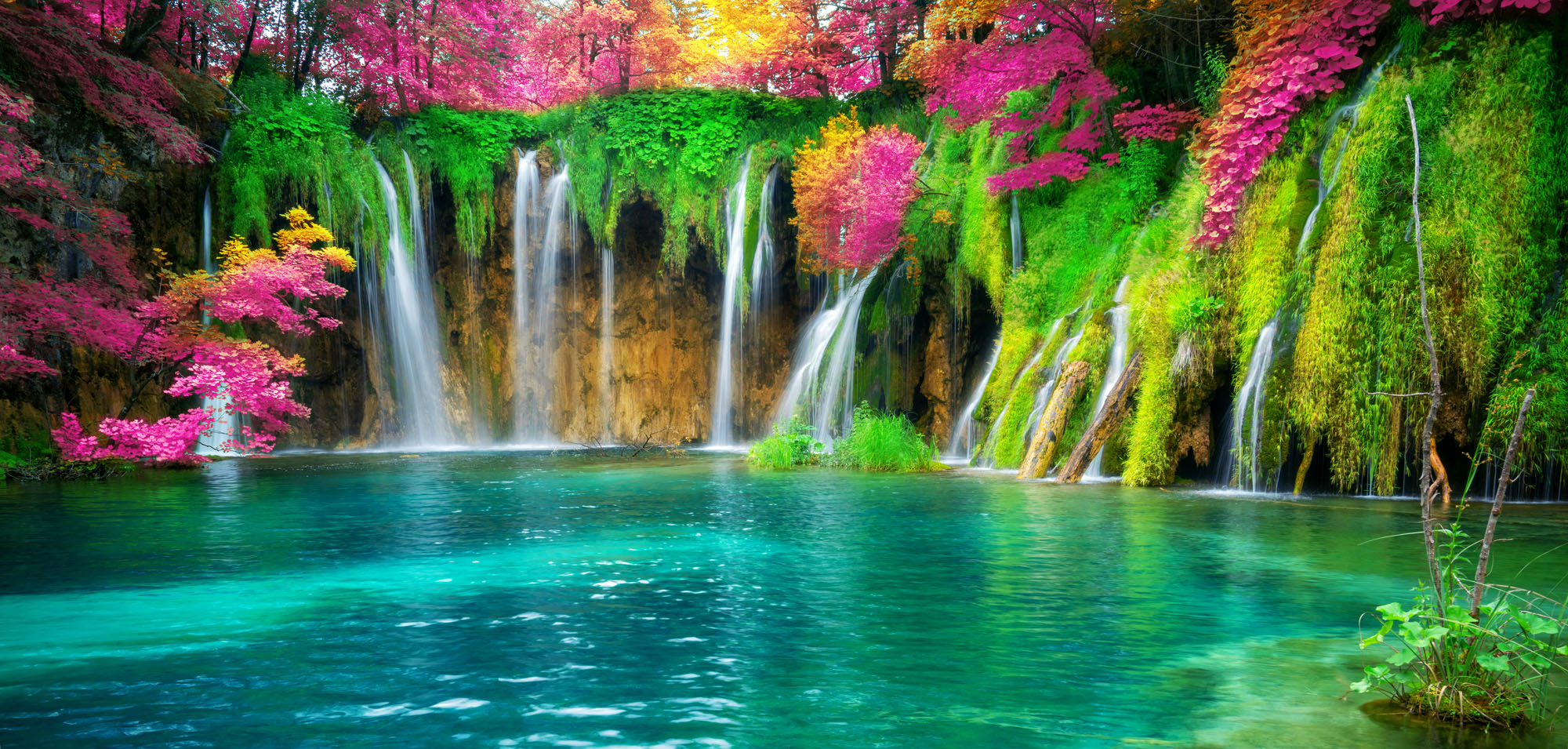 Panoramic mural of Plitvice Lakes waterfall and turquoise lake, ideal for indoor and outdoor spaces.