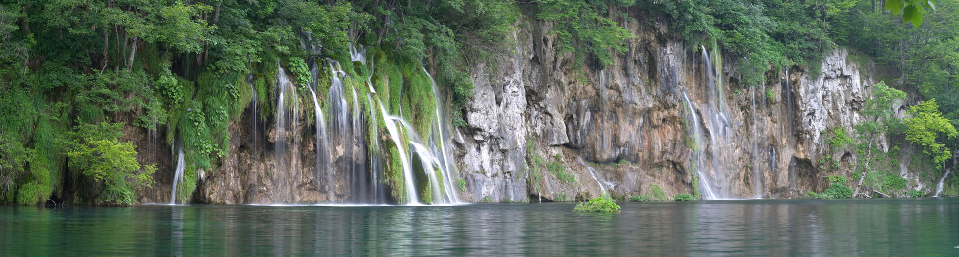 Panoramic mural of Plitvice Lakes waterfall, perfect for a serene indoor or outdoor atmosphere.