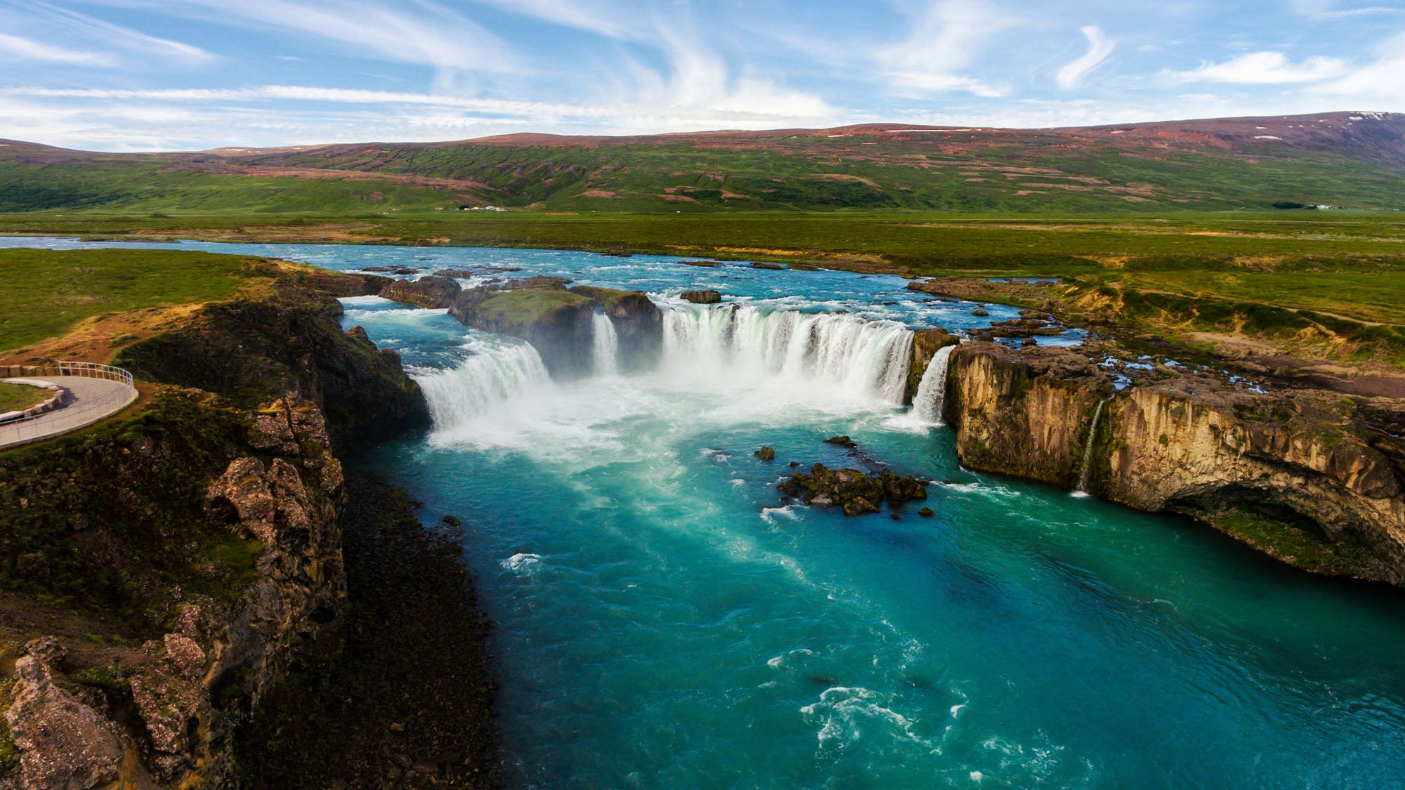 Aerial mural of Godafoss waterfall, ideal for adding Icelandic beauty to indoor and outdoor spaces.