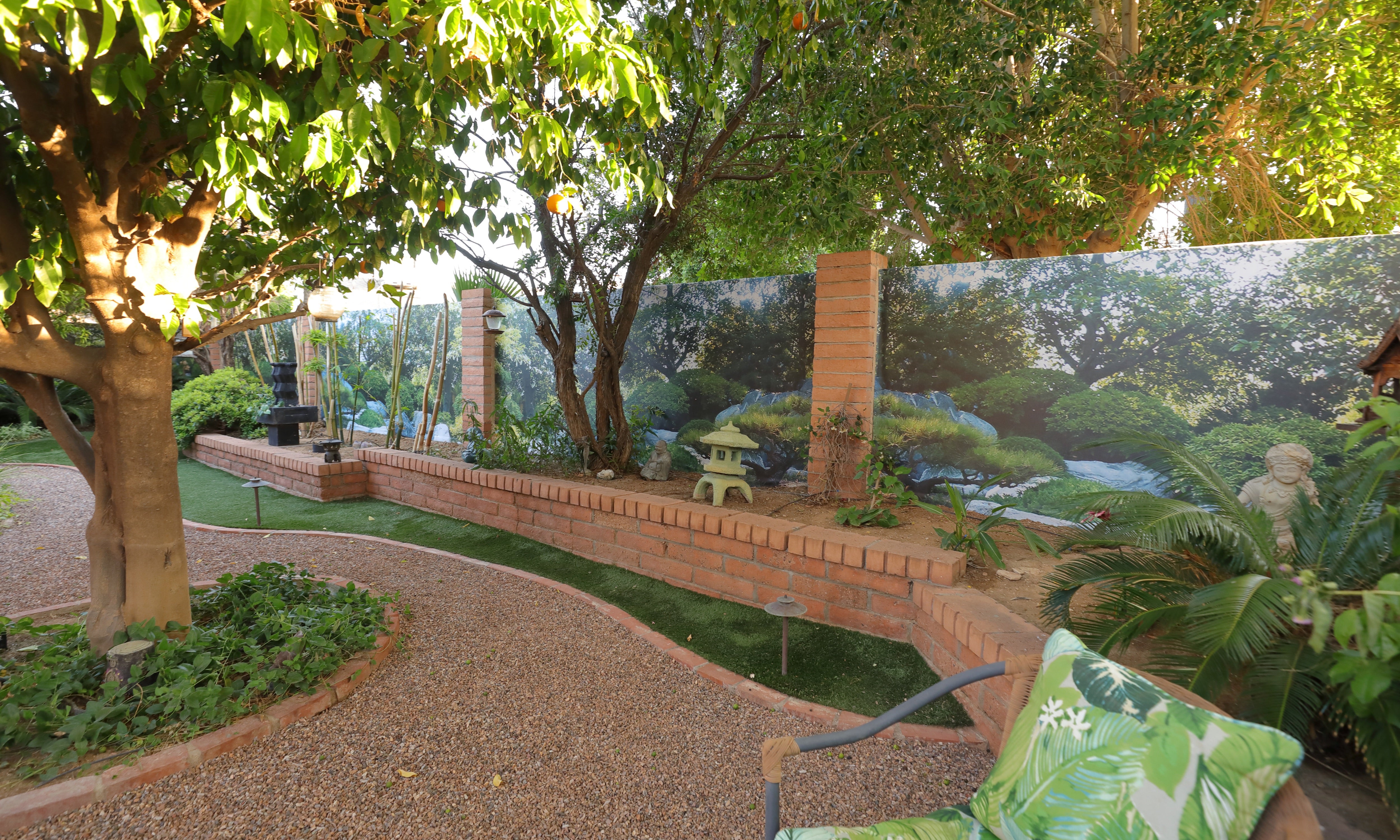 Forest water feature outdoor wall mural in residential backyard